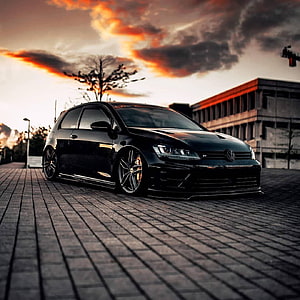 Black Volkswagen Golf R Stance Car Parked on Cobblestones at Sunset HD phone wallpaper
