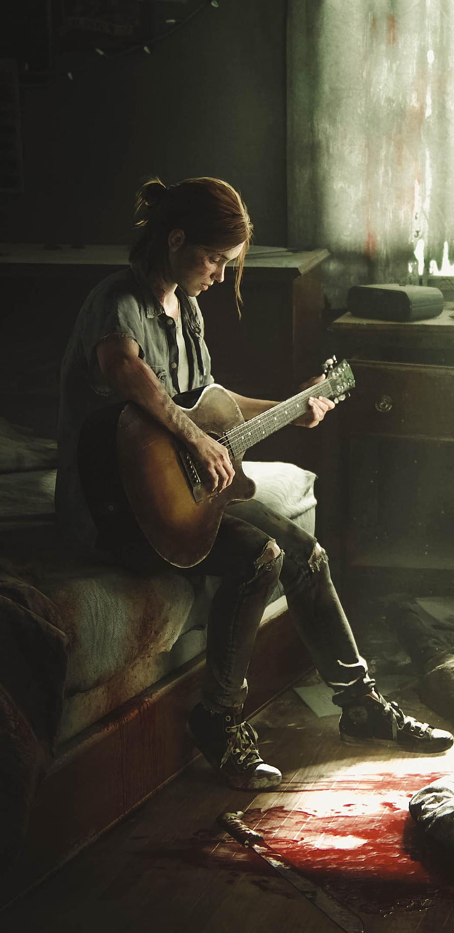 Ellie playing acoustic guitar in a dimly lit room with blood on the floor HD phone wallpaper
