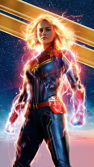 Captain Marvel Brie Larson Cosmic Energy Portrait with Golden Star Emblem and Electric Aura HD phone wallpaper