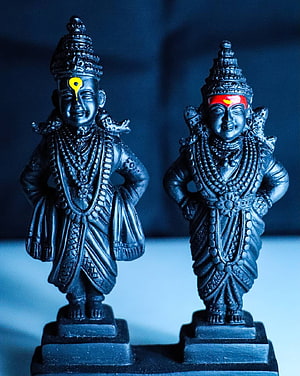 Black Vitthal and Rukmini Deity Statues with Traditional Ornamentation HD phone wallpaper
