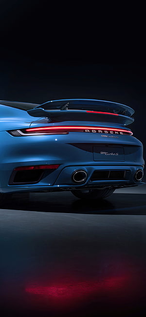Rear View of Blue Porsche 911 Turbo S with Illuminated Taillights and Spoiler HD phone wallpaper