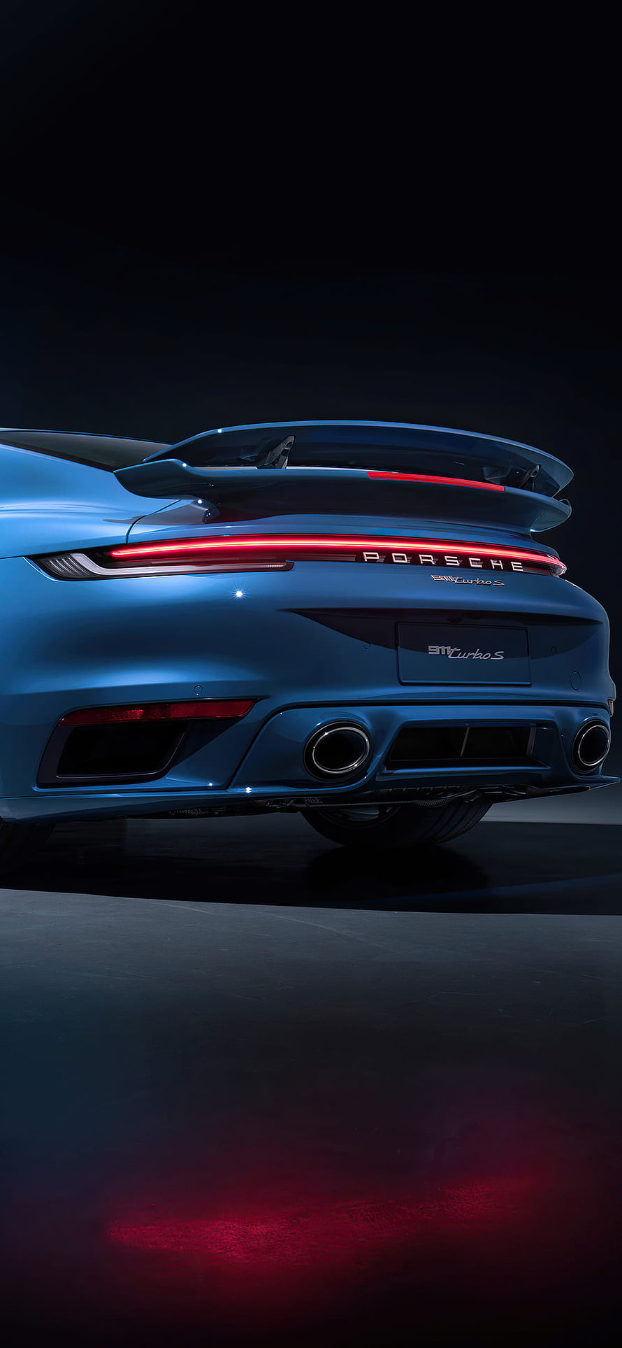 Rear View of Blue Porsche 911 Turbo S with Illuminated Taillights and Spoiler HD phone wallpaper