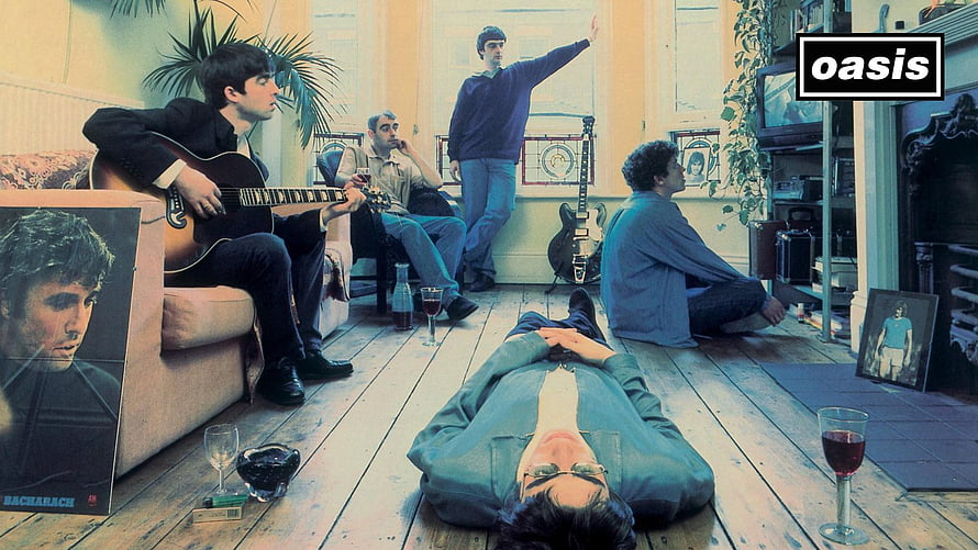 Oasis band members relaxing in a living room with guitars and drinks HD wallpaper