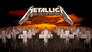 Metallica Cemetery at Dusk with Fiery Orange Sky and Stone Crosses HD wallpaper