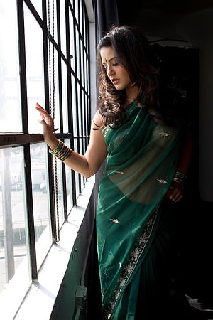 Woman in Green Saree Standing by Window, Pin on JUST, sunny leone saree HD phone wallpaper