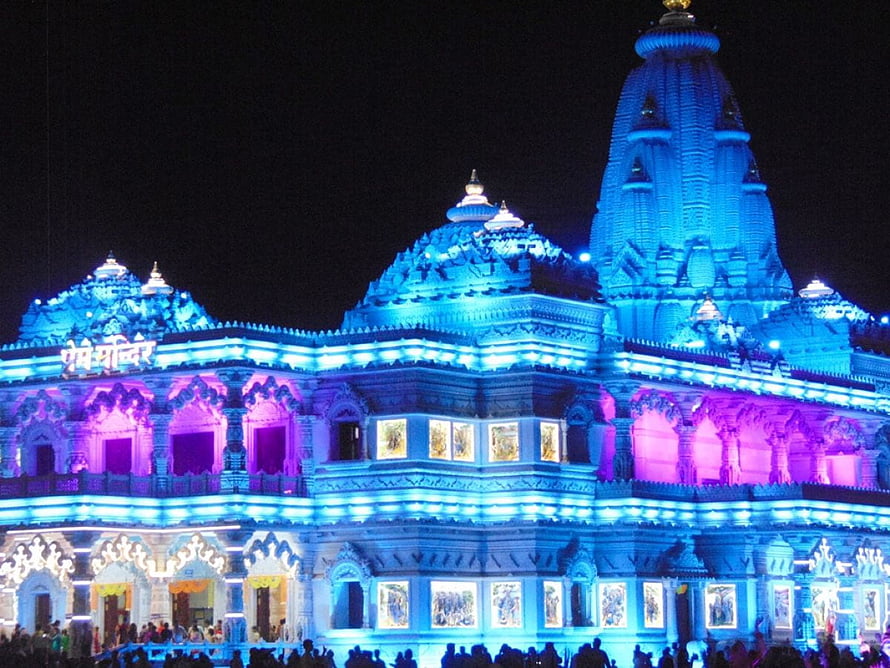 Prem Mandir Temple in Vrindavan Illuminated with Blue and Purple Lights at Night HD wallpaper