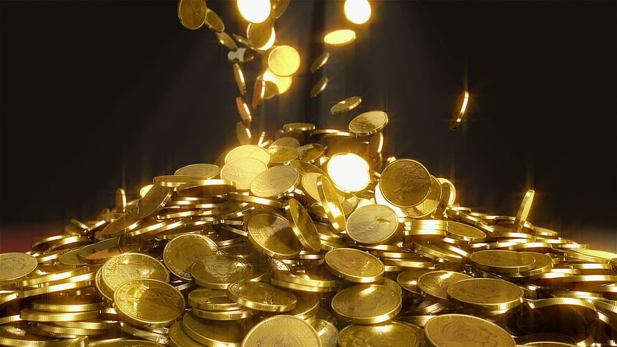 Shimmering Pile of Gold Coins with Falling Currency Against a Dark Background HD wallpaper