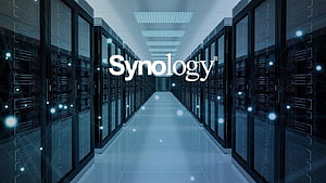Synology Server Room with Glowing Network Nodes and Blue Digital Overlay HD wallpaper