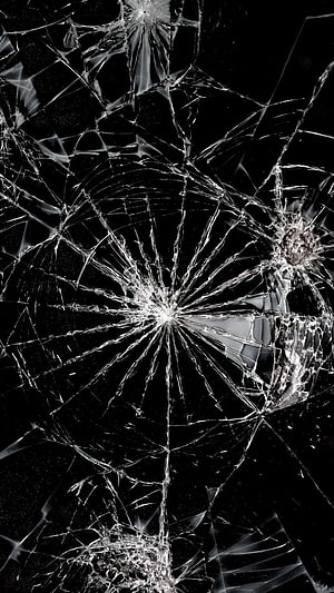 Shattered Glass Texture with Multiple Impact Points on Black Background HD phone wallpaper