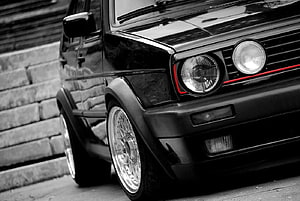 Black Volkswagen Golf Mk2 GTI with Red Accent Line and Chrome Rims HD wallpaper