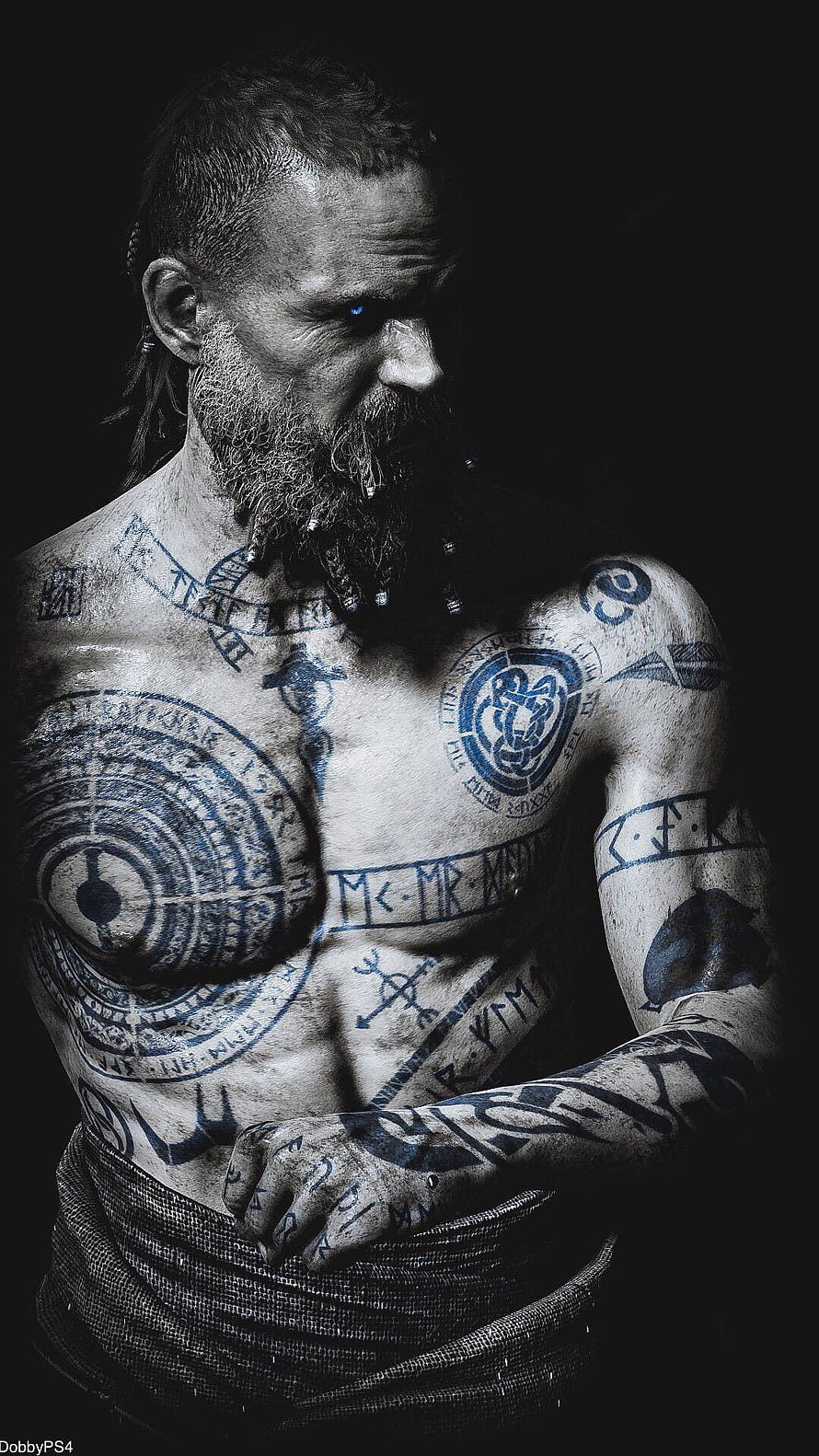 Kratos from God of War Ragnarok with blue glowing eye and intricate Norse tattoos HD phone wallpaper