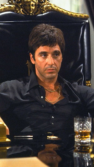 Al Pacino as Tony Montana in Scarface Seated in Ornate Black Leather Chair HD phone wallpaper