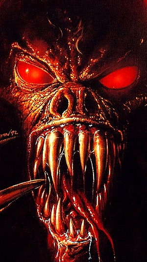 Terrifying Demon Face with Glowing Red Eyes and Sharp Fangs in Dark Horror Art HD phone wallpaper