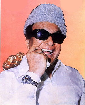 MGR Portrait in White Kurta with Fur Cap and Sunglasses HD phone wallpaper