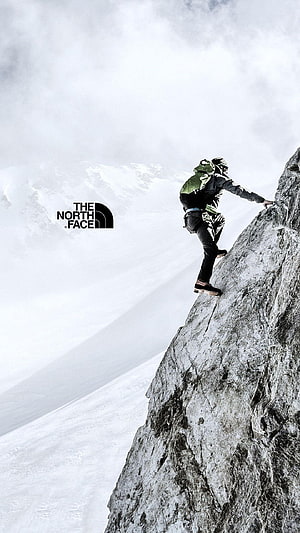 The North Face Alpine Rock Climber on Snowy Mountain Ridge HD phone wallpaper