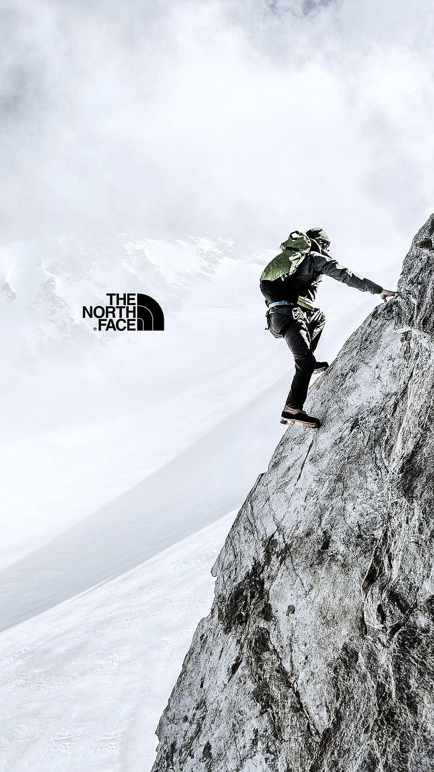 The North Face Alpine Rock Climber on Snowy Mountain Ridge HD phone wallpaper