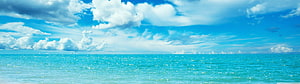 Sunny Summer Ocean Horizon with Turquoise Water and Fluffy White Clouds HD wallpaper