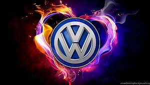 Volkswagen Logo Surrounded by Vibrant Neon Flames and Smoke on a Dark Background HD wallpaper