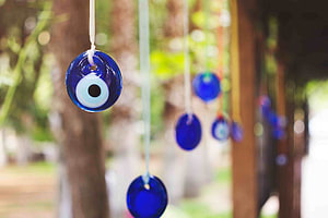 Blue Evil Eye Amulets Hanging Outdoors HD wallpaper
