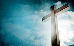 Towering Concrete Cross Against Dramatic Blue Sky With Clouds HD wallpaper