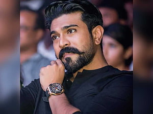 Ram Charan in Black Shirt with Gold Watch and Full Beard HD wallpaper