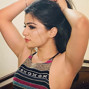 Young woman with dark hair in a colorful striped knit top posing with arms raised, Indians girls desi hairy ARMPITS and Underarms, indian women armpit HD phone wallpaper