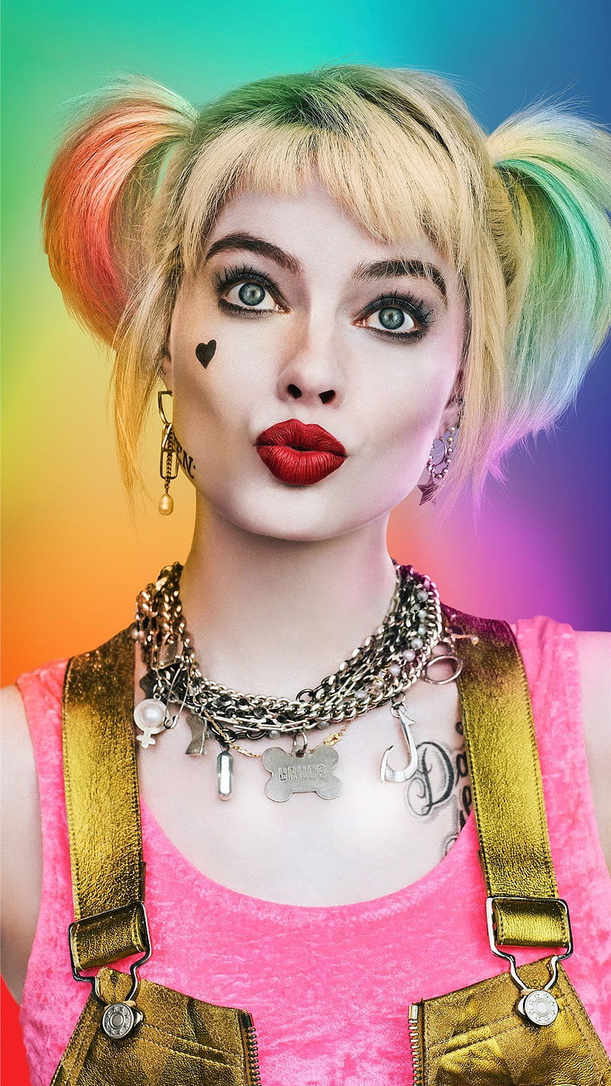 Harley Quinn Cosplay Portrait With Colorful Pigtails And Gold Overalls Against Rainbow Background HD phone wallpaper