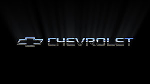 Chevrolet Logo Chrome Emblem On Black Background With Light Rays HD wallpaper