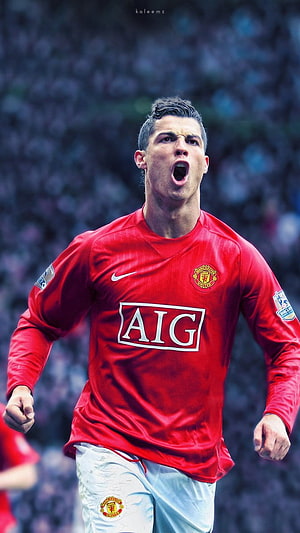 Cristiano Ronaldo in Manchester United Red Kit Celebrating on the Pitch HD phone wallpaper