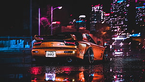 Orange Mazda RX-7 FD Night Drive on Wet City Street with Neon Reflections HD wallpaper