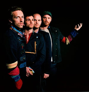 Coldplay Band Members in Colorful Jackets Against Black Background HD phone wallpaper