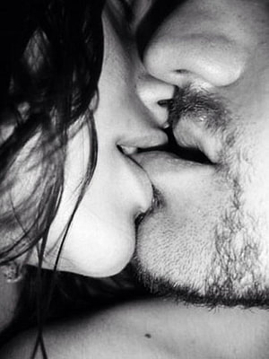 Intimate Black and White Close-Up of a Romantic French Kiss Between a Couple HD phone wallpaper