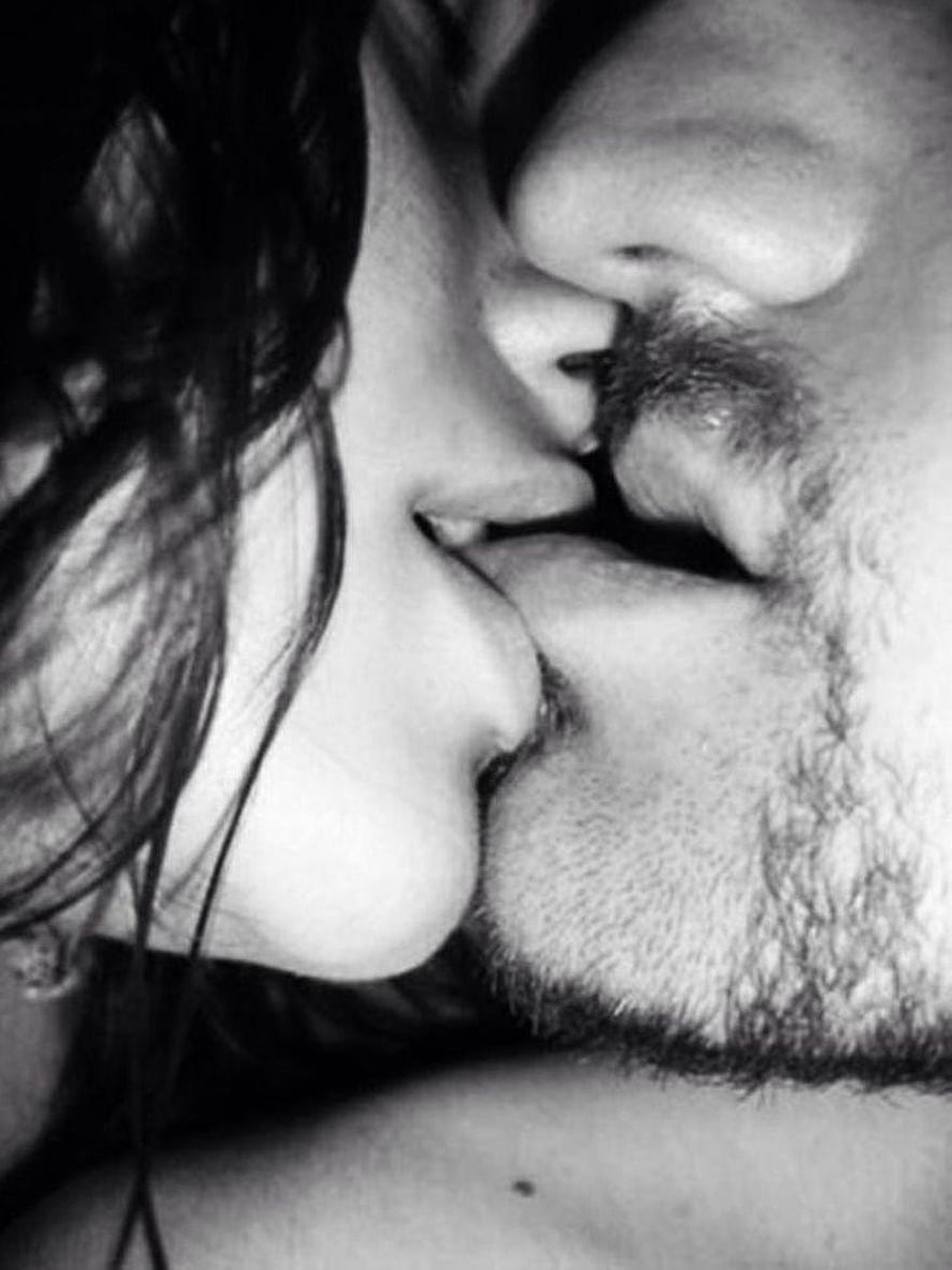 Intimate Black and White Close-Up of a Romantic French Kiss Between a Couple HD phone wallpaper