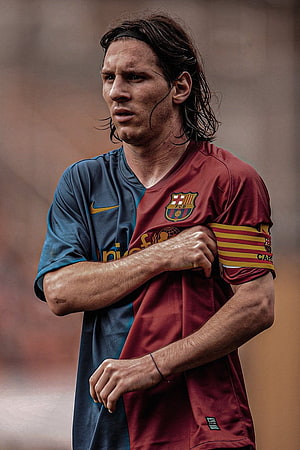 Lionel Messi Wearing FC Barcelona Split Jersey Portrait HD phone wallpaper