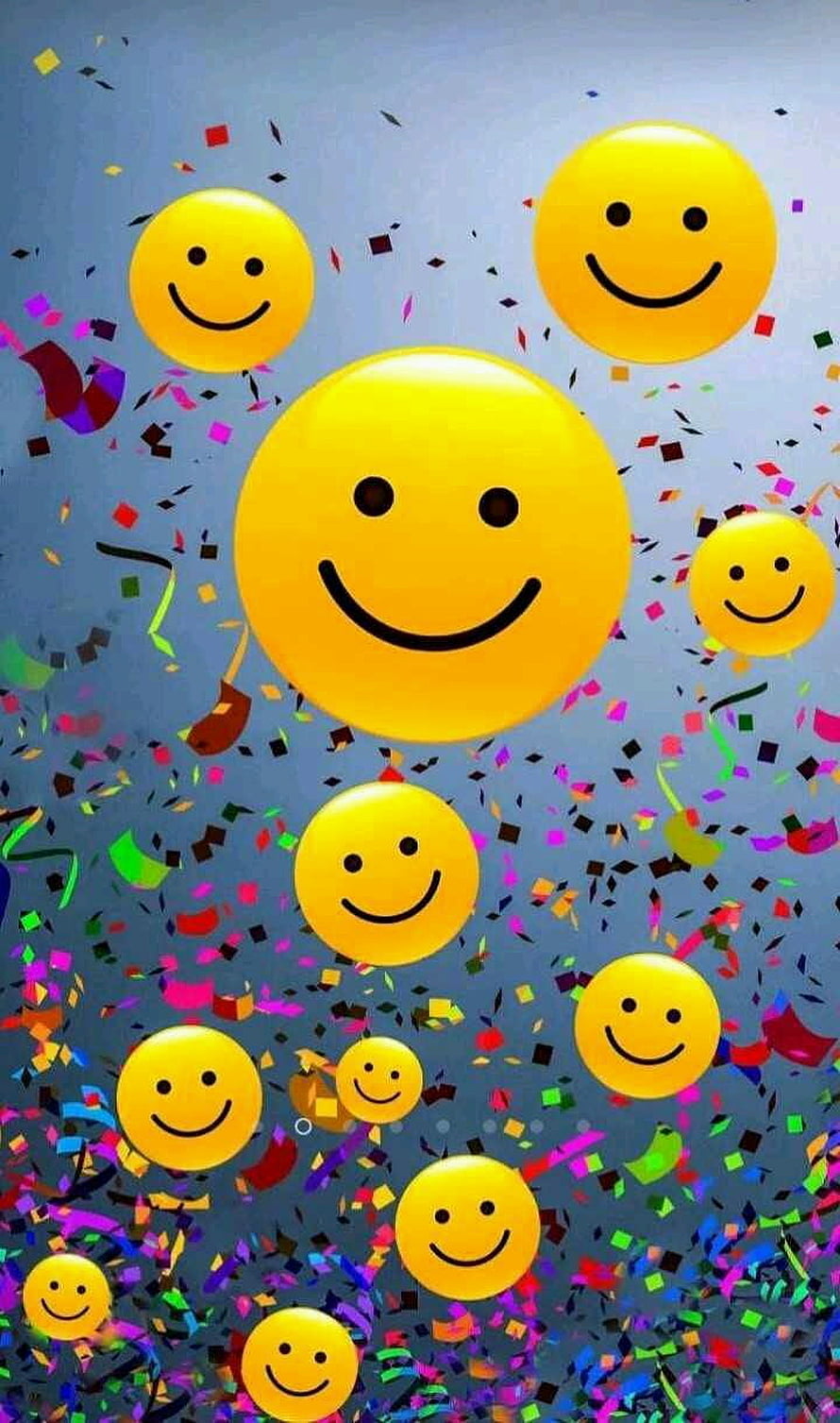 Festive Yellow Smiley Faces Floating Amidst Colorful Confetti on a Blue Background HD phone wallpaper