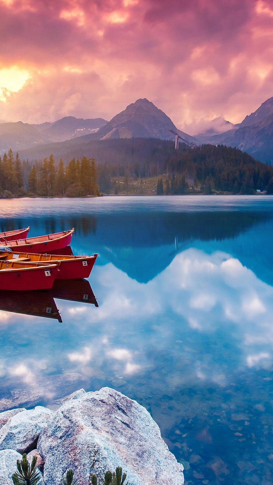 Alpine Lake at Sunset with Red Rowboats and Mountain Reflections HD phone wallpaper