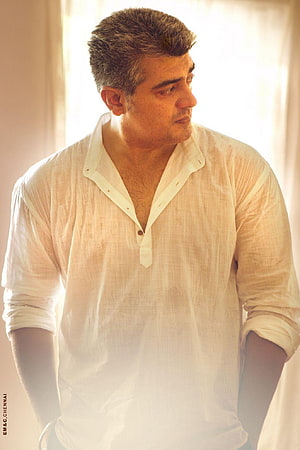 Portrait of a man in a white linen shirt with rolled sleeves looking away in soft natural light, ajith kumar New, ajith kumar HD phone wallpaper