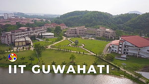 Aerial View of IIT Guwahati Campus with Lush Green Lawns and Academic Buildings HD wallpaper