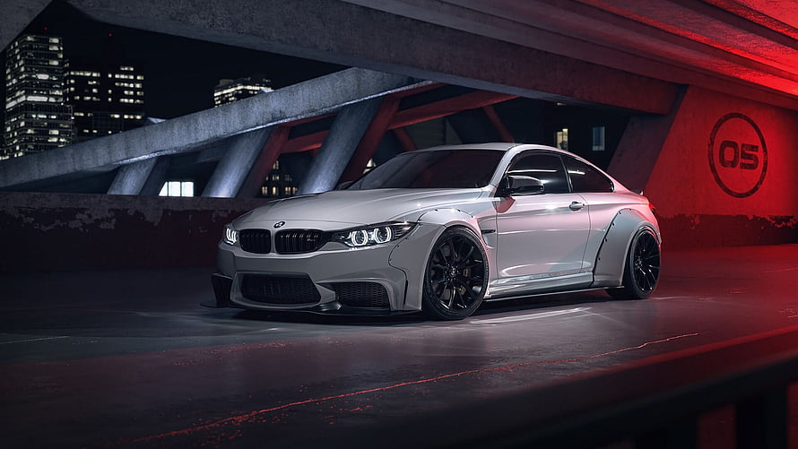 Silver BMW M4 Coupe with Widebody Kit Parked Under Urban Bridge at Night HD wallpaper