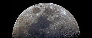 Full Moon Surface Close-Up Against Deep Black Space Background HD wallpaper