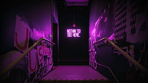 Purple Neon Sign in Dark Urban Stairwell with Graffiti Walls HD wallpaper