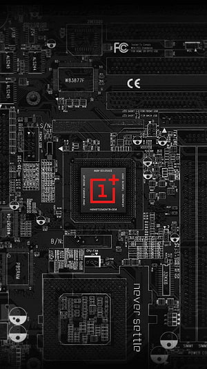 OnePlus Circuit Board Design with Red Logo and Never Settle Slogan on Dark PCB Background HD phone wallpaper