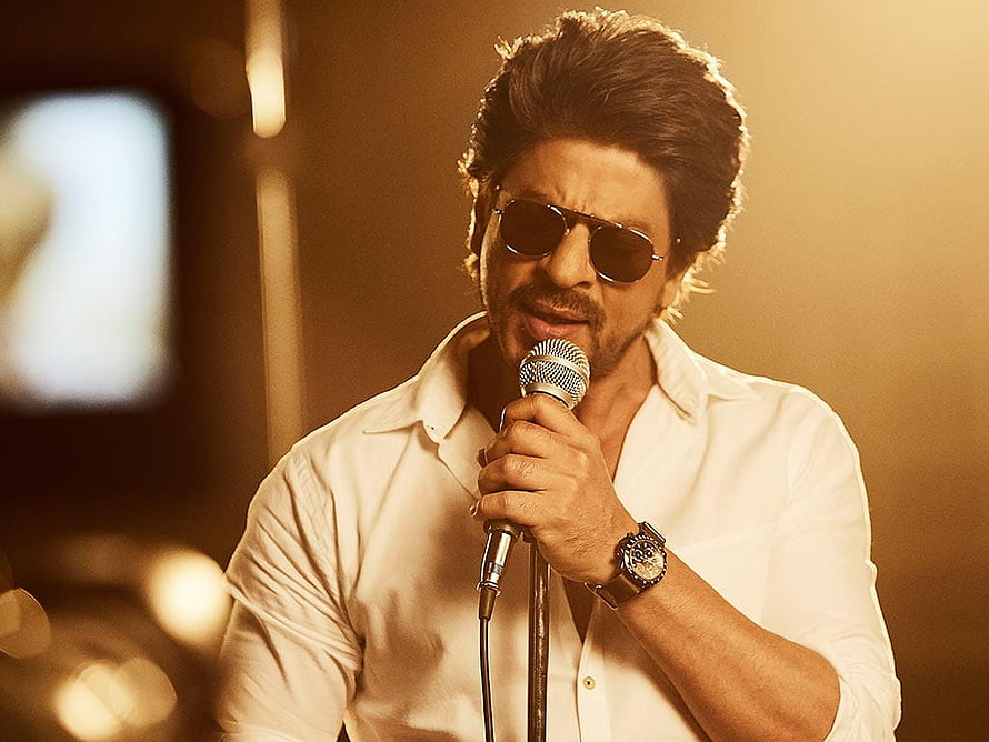 Shah Rukh Khan singing into a microphone wearing sunglasses and a white shirt HD wallpaper