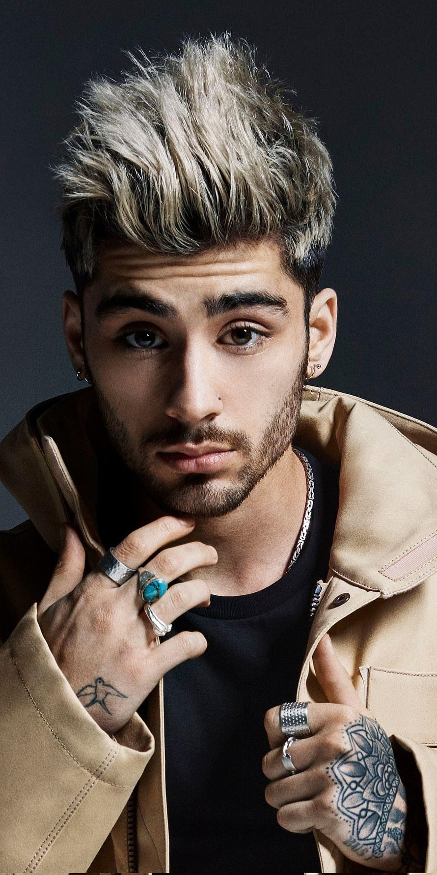 Zayn Malik Studio Portrait With Spiky Blonde Hair, Beige Jacket, and Hand Tattoos HD phone wallpaper