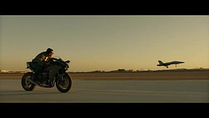 Top Gun Maverick Motorcycle Chase Scene With Fighter Jet Takeoff HD wallpaper