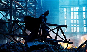 Batman standing on rubble in a burning industrial structure from The Dark Knight, The Dark Knight at 10: how Christopher Nolan reshaped superhero cinema, batman christopher nolan HD wallpaper