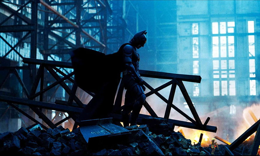 Batman standing on rubble in a burning industrial structure from The Dark Knight, The Dark Knight at 10: how Christopher Nolan reshaped superhero cinema, batman christopher nolan HD wallpaper