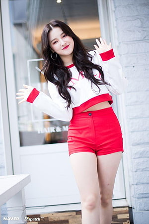 Nancy Jewel McDonie in a white and red crop top with matching shorts HD phone wallpaper