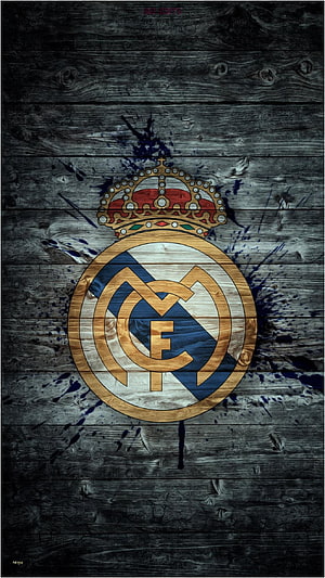 Real Madrid CF Logo on Dark Wood Background with Blue Splatter HD phone wallpaper