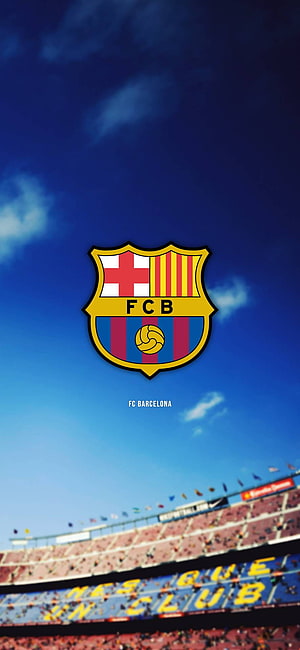 FC Barcelona crest centered above Camp Nou stadium stands under a vivid blue sky with scattered clouds HD phone wallpaper